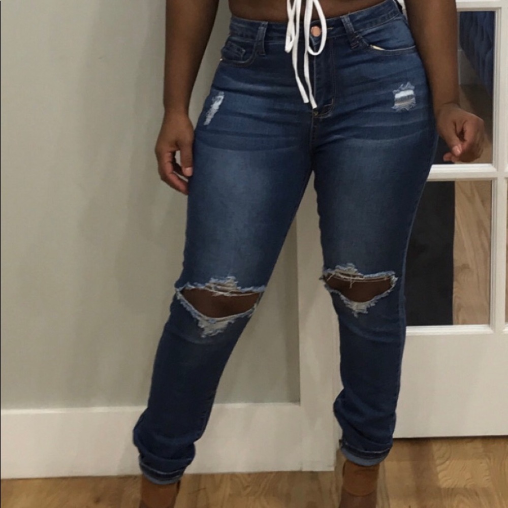 High rise stretch distressed jeans